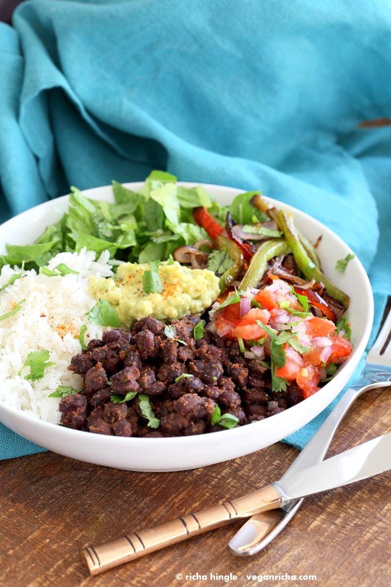 Easy Burrito Bowl. Spicy black beans, roasted peppers and veggies, zesty guacamole, pico de gallo, fresh lettuce. DIY Burrito Bowl Chipotle style. | VeganRicha.com #vegan #glutenfree #soyfree #bowl #recipe