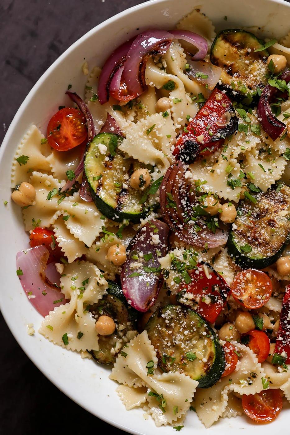 close-up of summer pasta salad with grilled vegetables