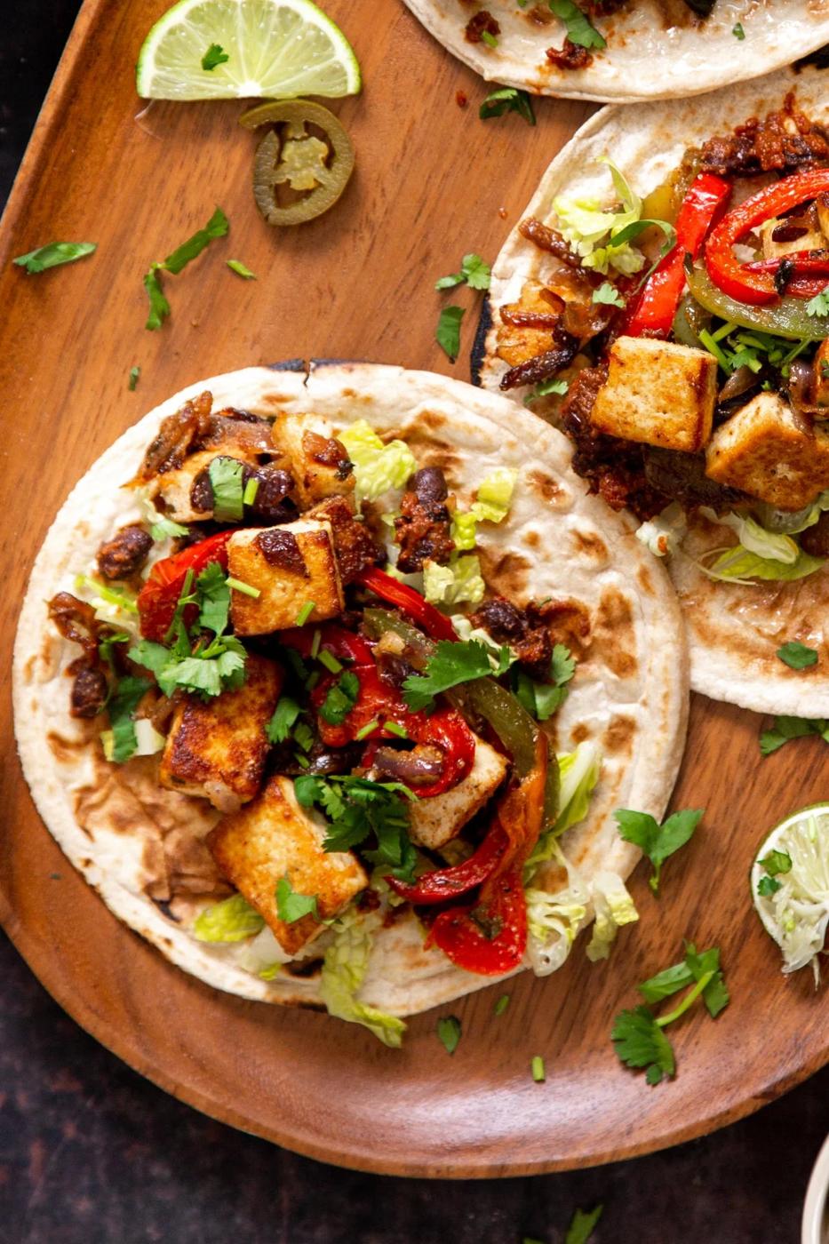vegan tex mex tofu tacos with bell peppers and fresh cilantro