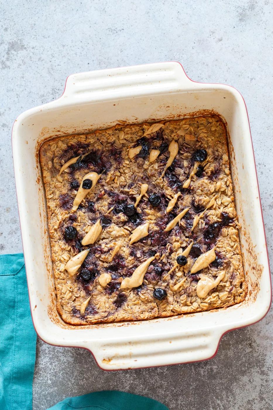 Peanut Butrer And Jelly Oatmeal in a white baking dish