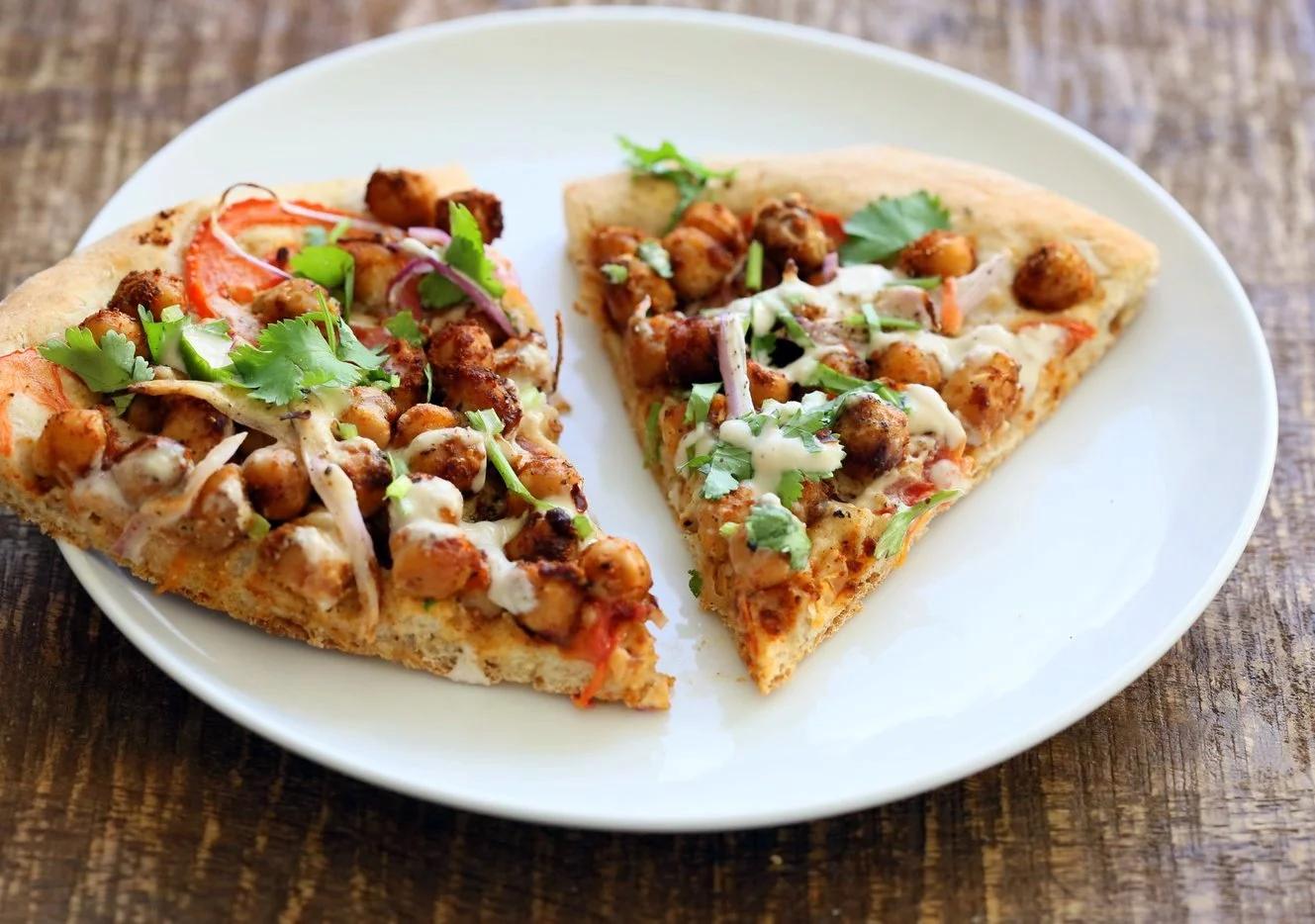 Ethiopian Berbere Chickpea Pizza with Tahini Garlic Dressing. Amazingly flavorful pizza. Dress with tahini dressing, vegan ranch or other creamy dressing. Vegan Soyfree Nut-free Recipe. Gluten-free Crust option. | VeganRicha.com