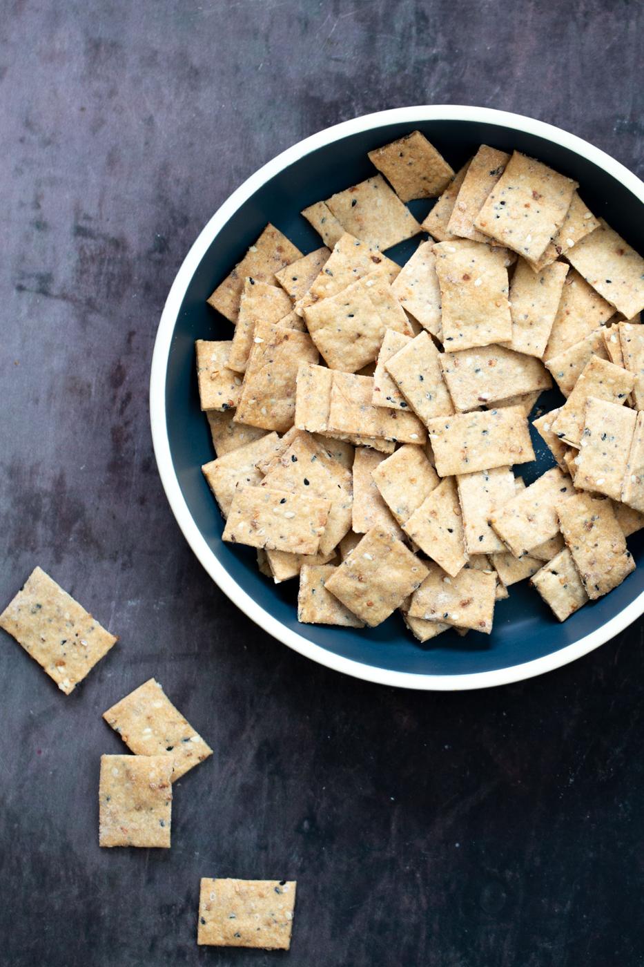 a bowl with vegan Everything But the Bagel Crackers