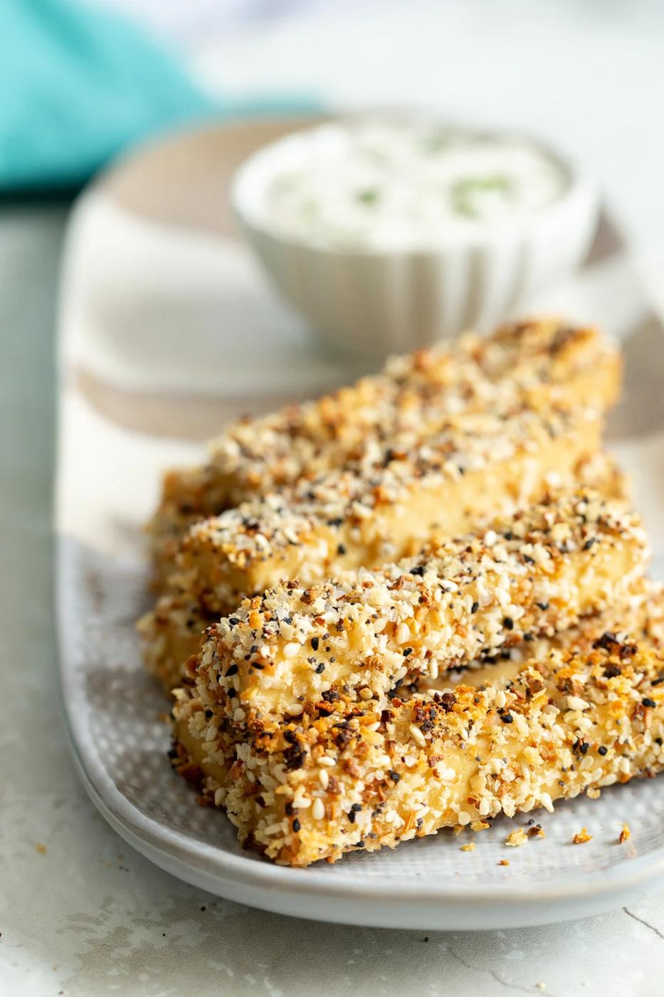 Our Everything Bagel Tofu on a white and grey serving platter