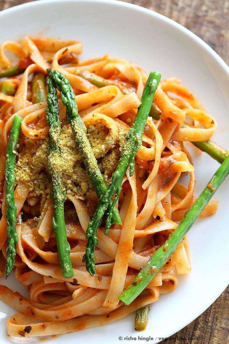 Fettuccine with Tomato Cream Sauce and Asparagus. Easy tomato Cream sauce with pasta and garlic roasted Asparagus. Use other veggies of choice. Add some chickpea chorizo or smoked coconut for variation. Vegan Soyfree Recipe. Can be gluten-free with gf pasta. | VeganRicha.com
