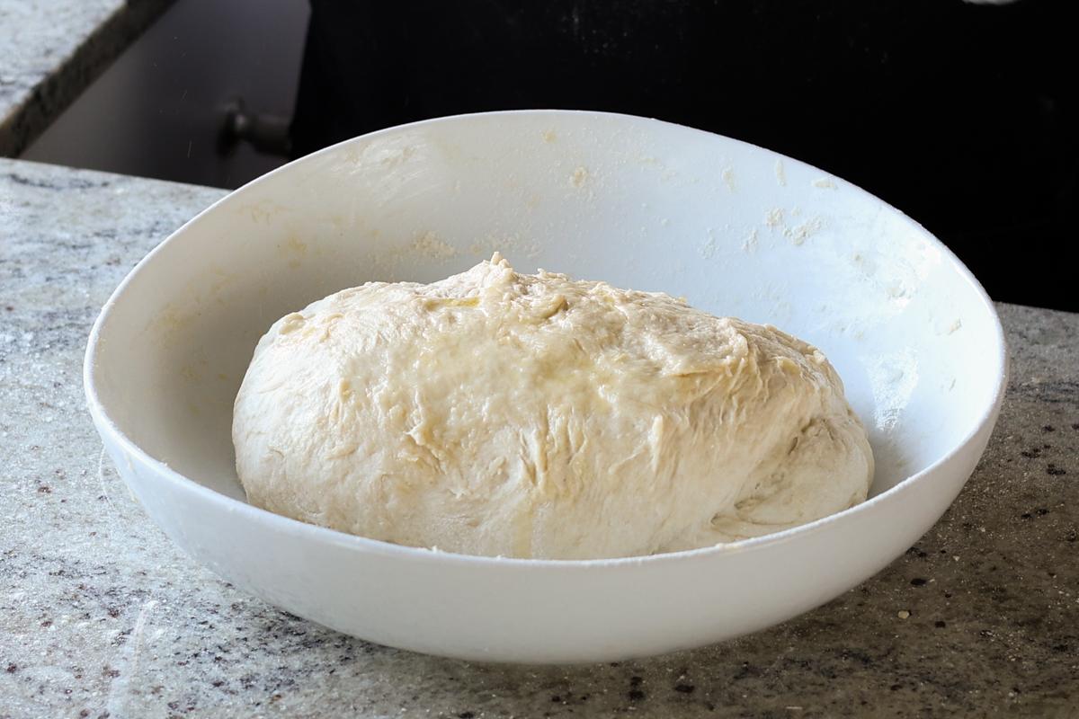 dough in the bowl, ready to rise
