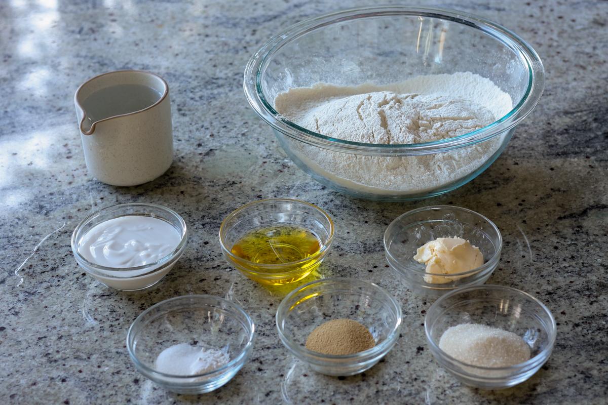 ingredients for fluffy dinner rolls on the counter