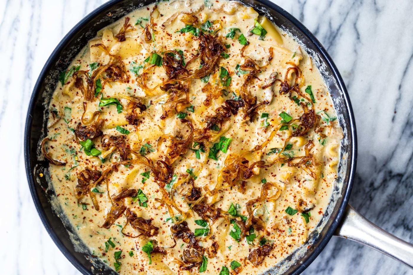a black skillet with vegan French Onion Skillet