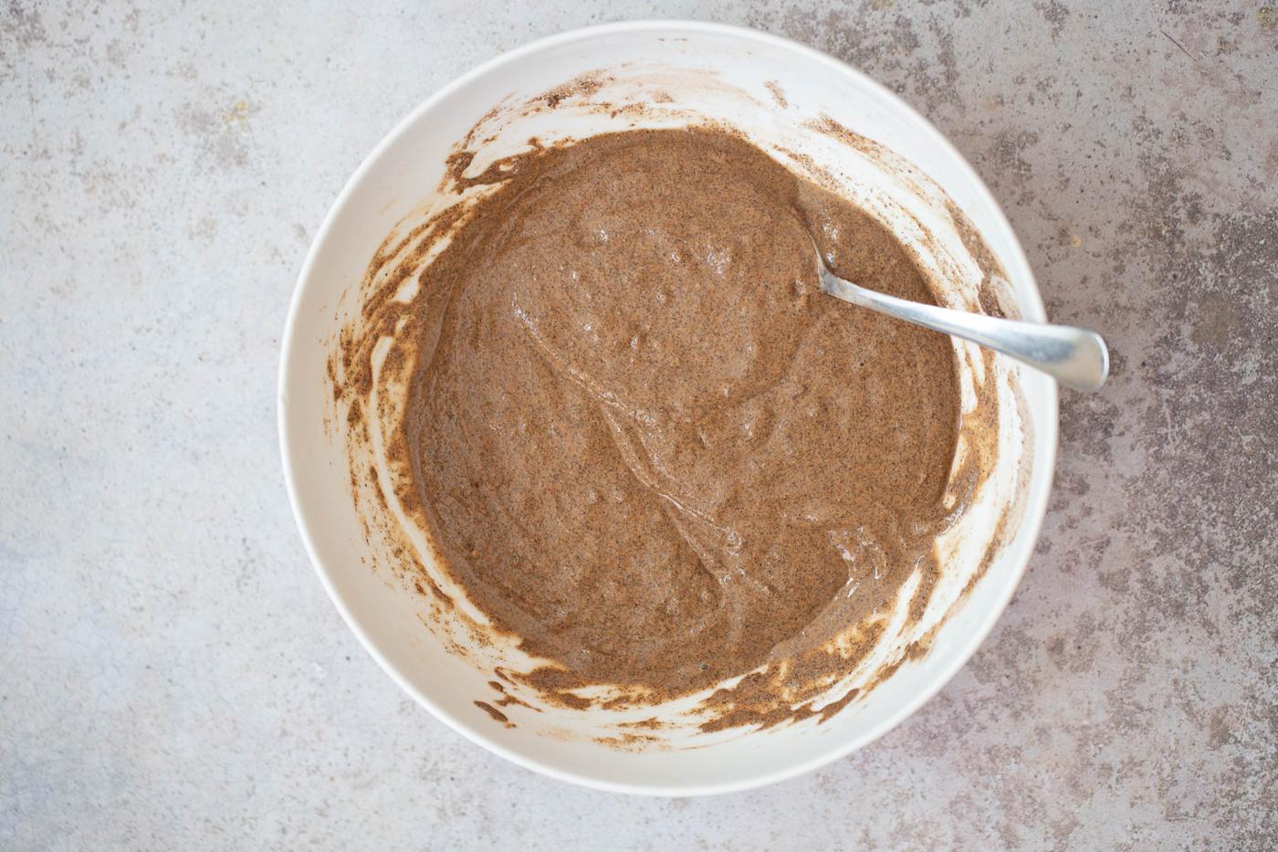 chocolate waffle batter in a white bowl