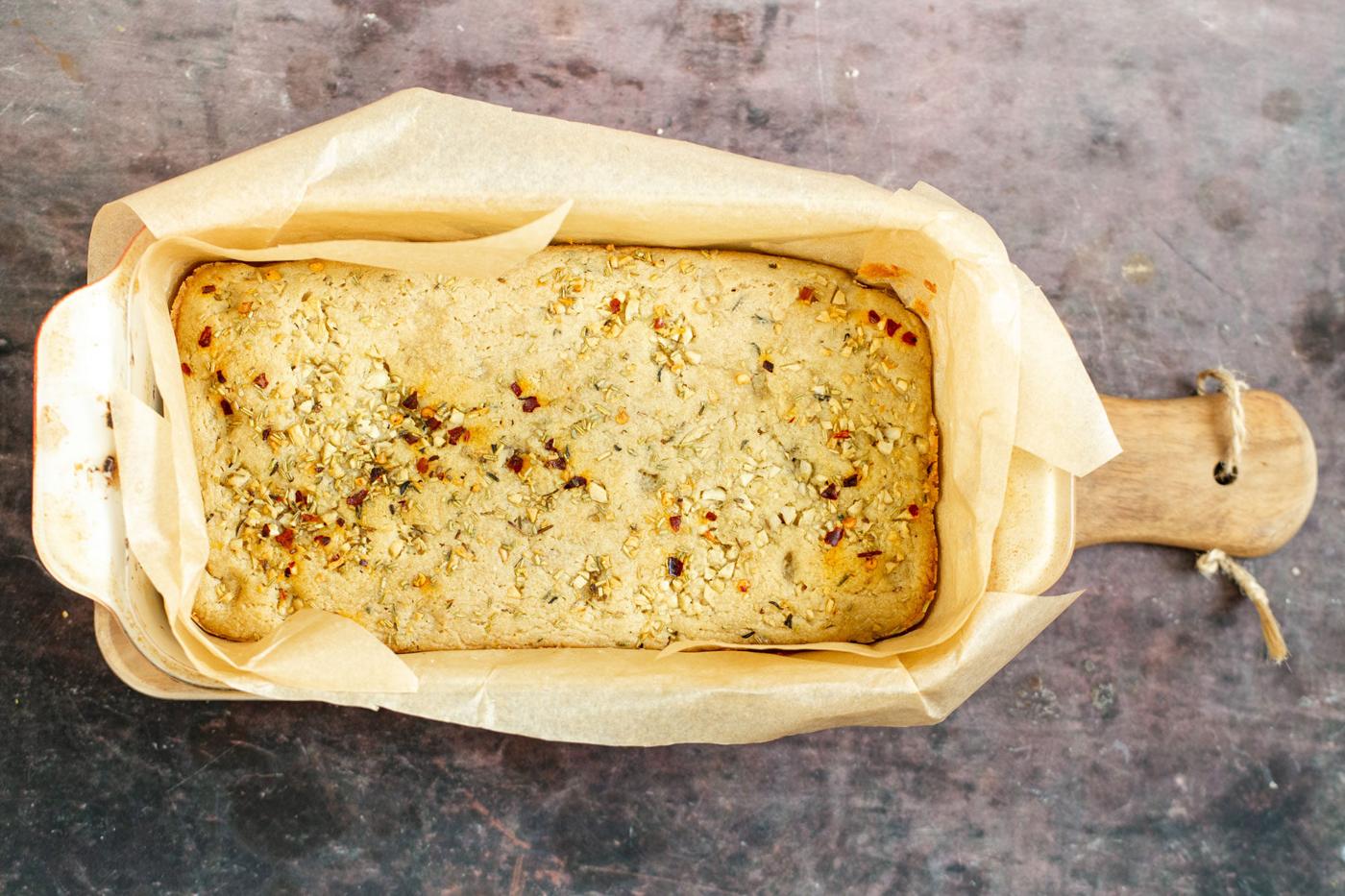freshly baked glutenfree focaccia bread in a loaf pan