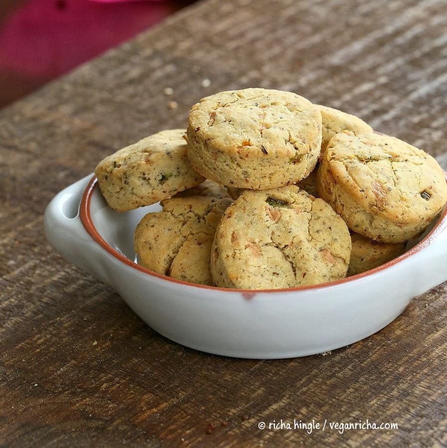 a white porcelain bowl filled with vegan gluten-free cheese and jalapeno biscuits