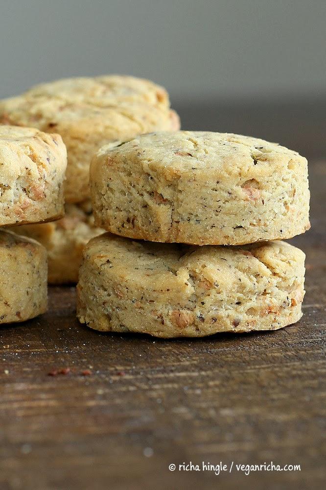stacked vegan gluten-free biscuits with cheddar cheese and jalapenos