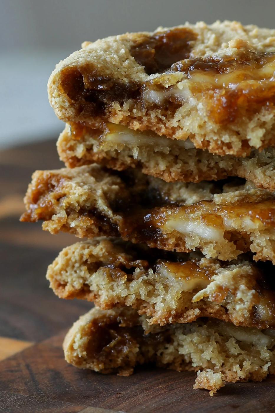 stack of halved tiramisu cookies, so you can see inside them