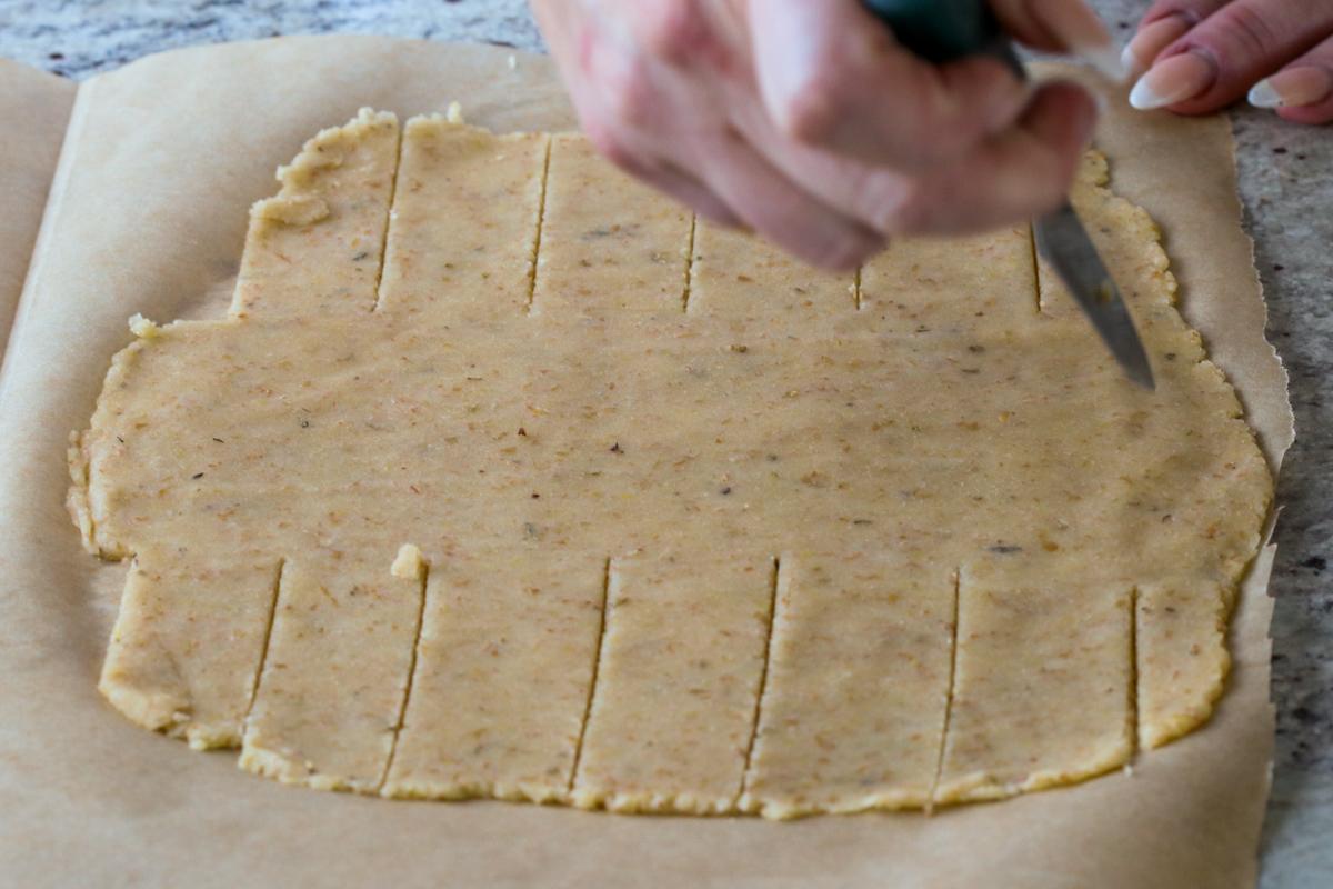 slicing dough for wrapping the Wellington