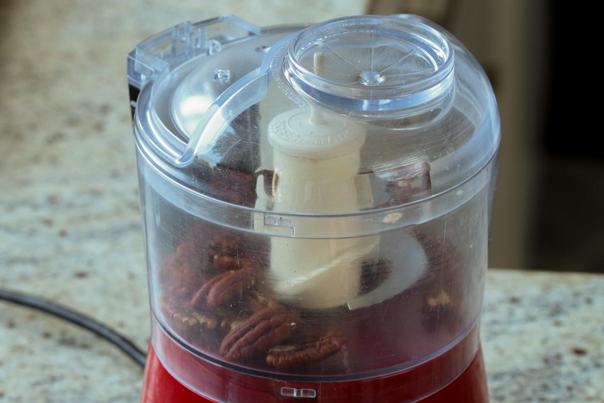 pecans, onion, and garlic in the food processor before running it
