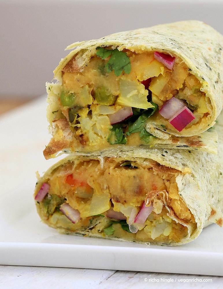 stacked vegan red lentil hummus wraps with cauliflower and potato