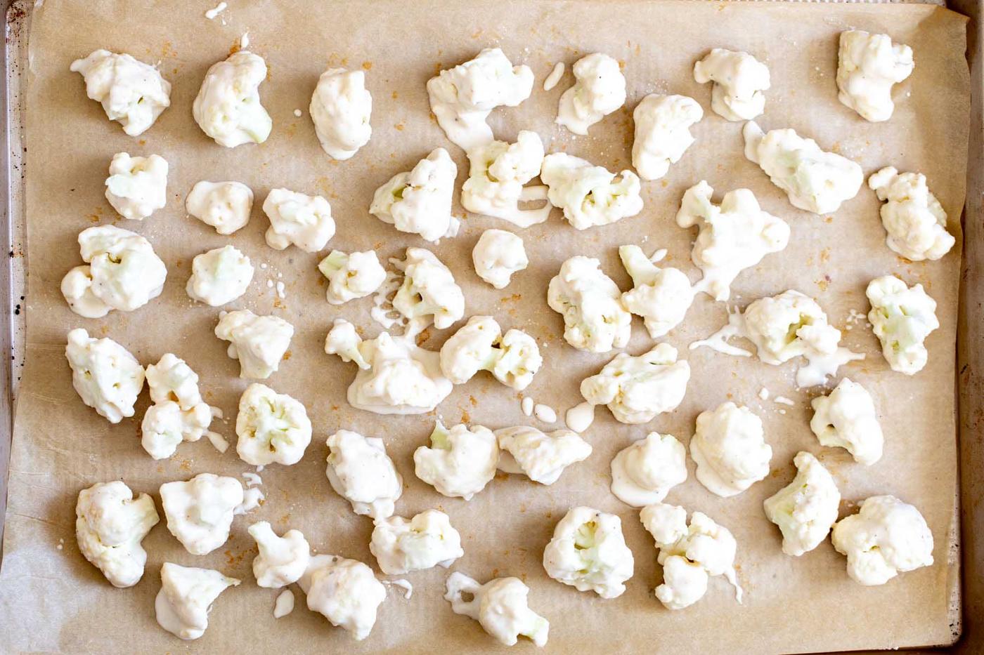 cauliflower on the baking sheet before baking