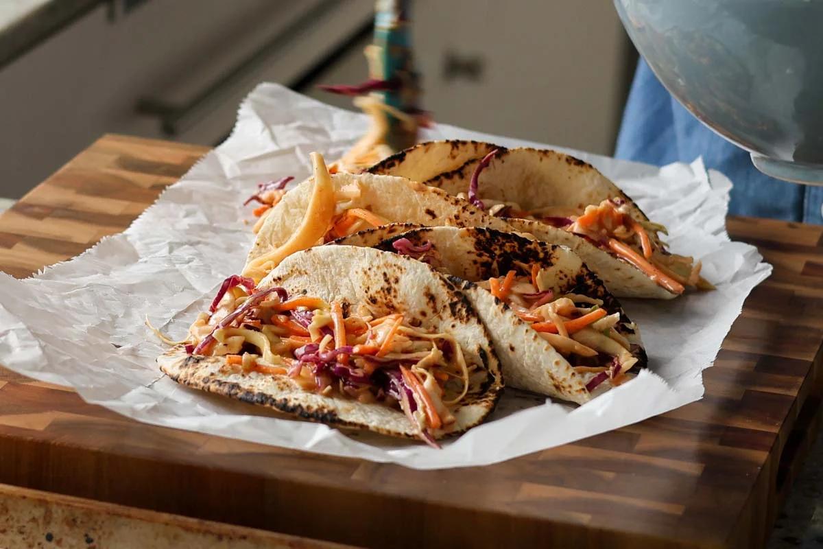 gochujang tacos on a piece of parchment paper