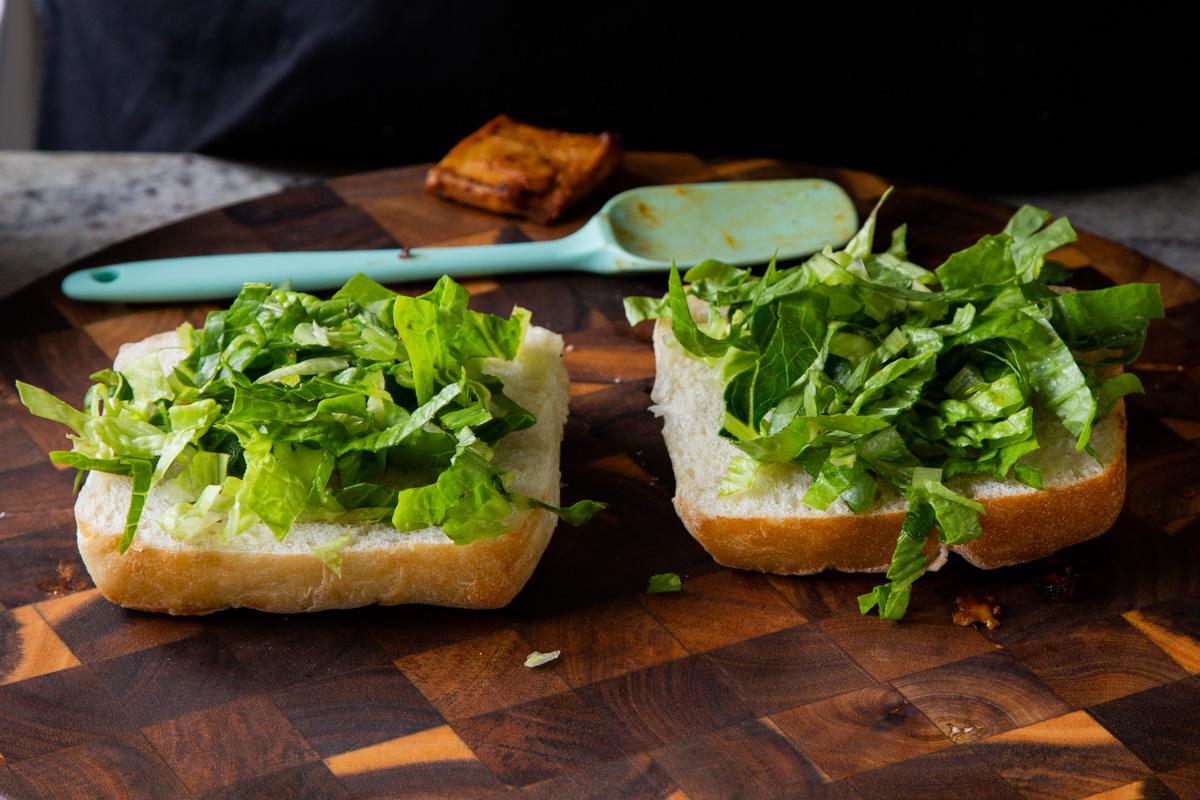 ciabatta rolls with lettuce on them