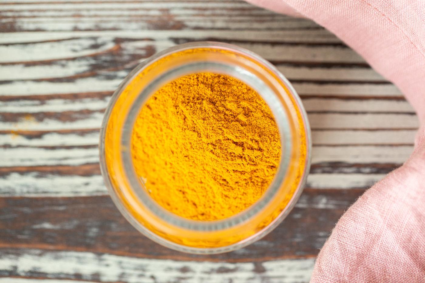Turmeric for our Golden Chai Mix in a glass container