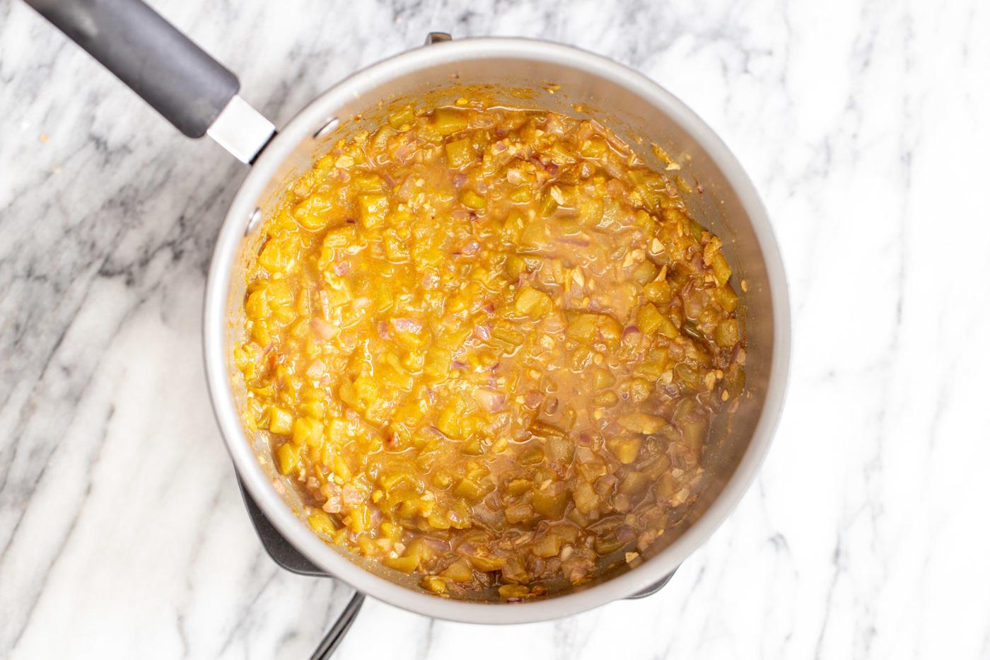 vegan enchilada soup cooking in a sauce pan