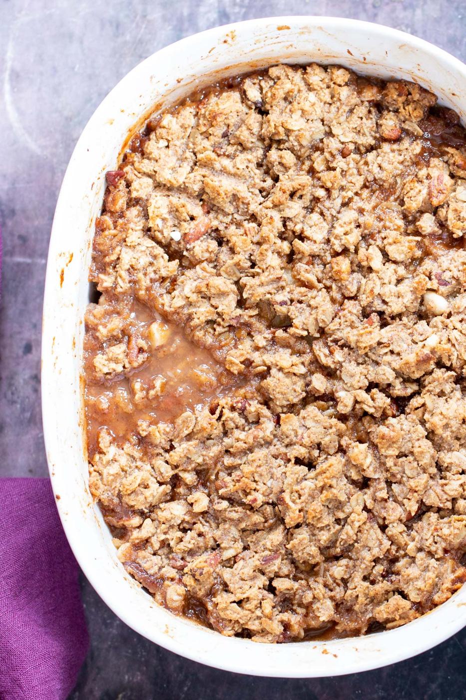 a casserole dish with apple pear crisp