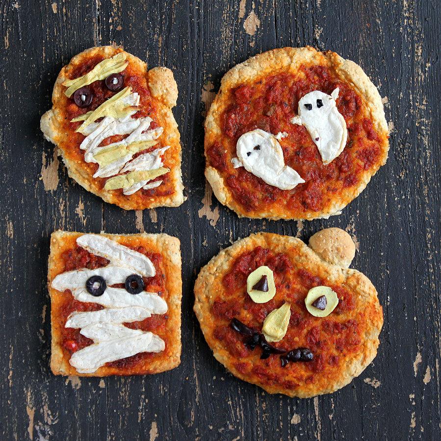 Halloween Pizzas: Ghosts, Pumpkins and Mummies with coconut milk Mozzarella, Cheddar, Sundried Tomato Marinara on Sesame Barley crust. vegan recipe