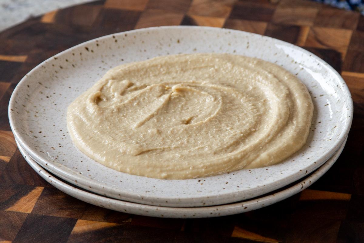 hummus spread onto a plate