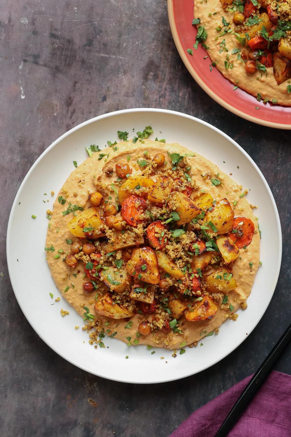 harissa bean puree topped with roasted vegetables and baharat walnuts