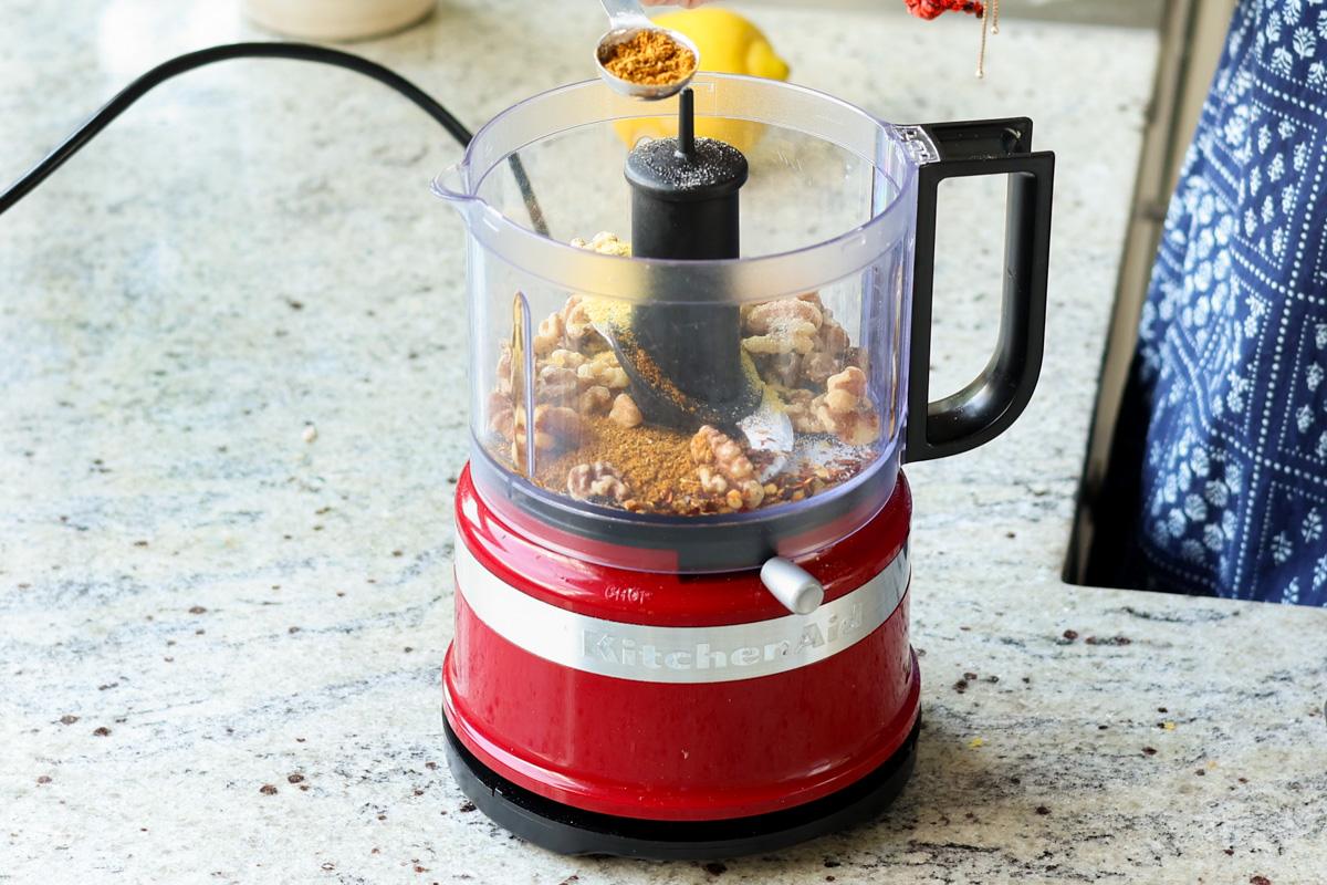 walnuts in the food processor before grinding