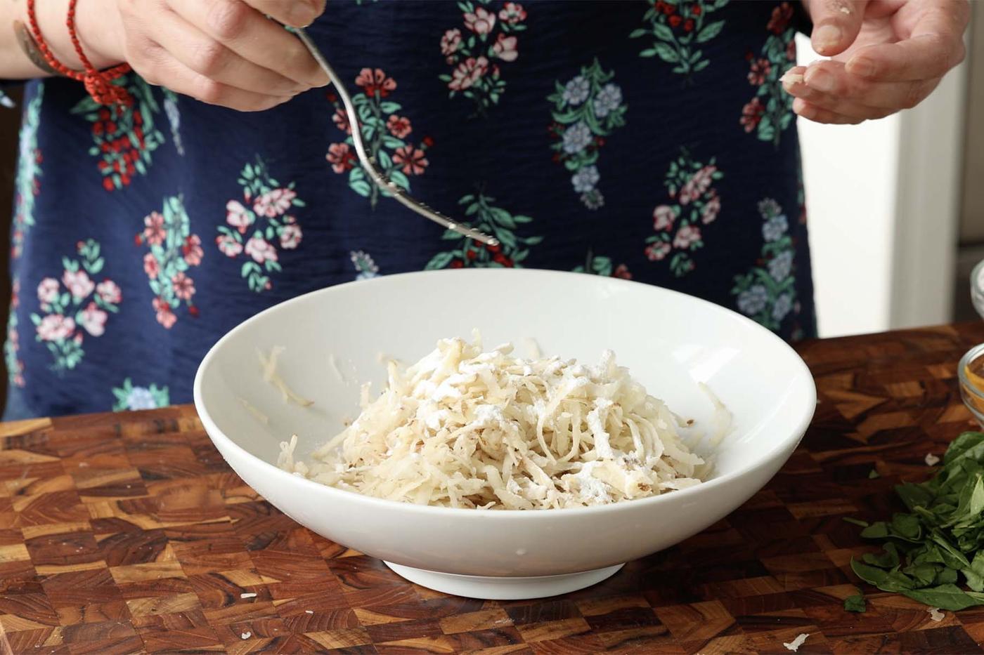 adding cornstarch to the potatoes