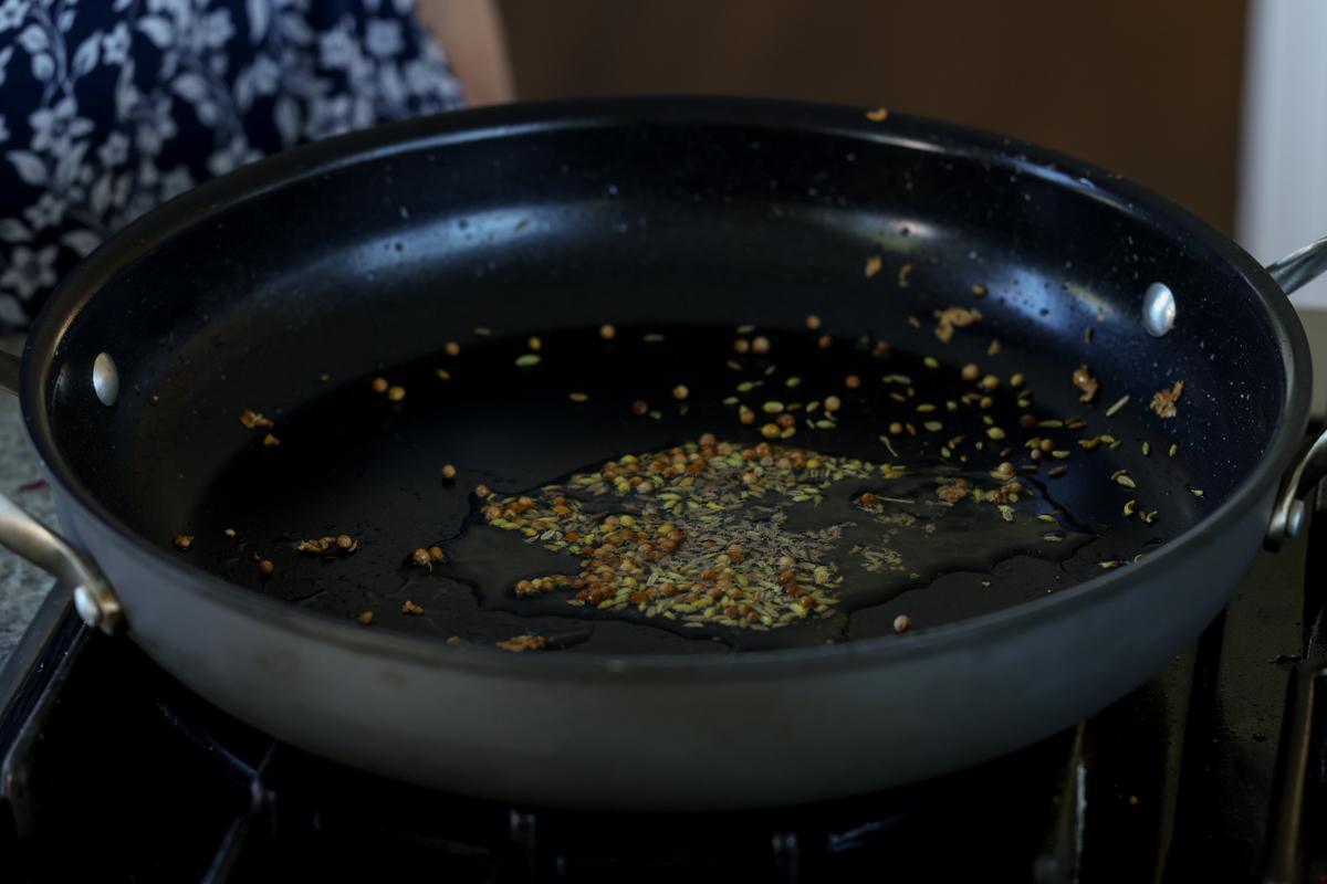 roasted whole spices in the pan