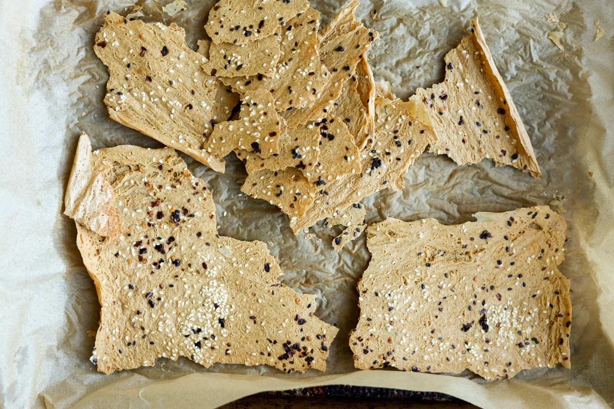 tofu chips on the baking sheet after baking
