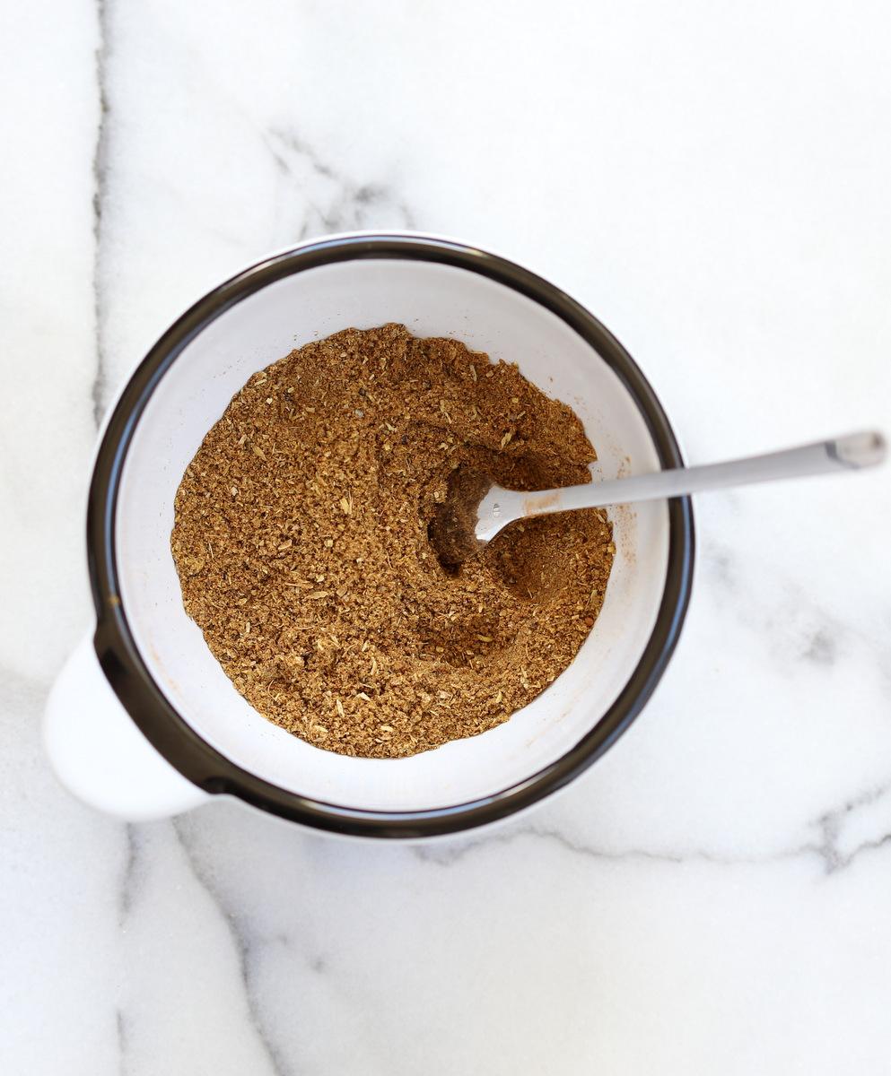 This quick Garam Masala spice blend takes 2 mins to make at home with everyday spices. Use it in Indian dishes, with roasted veggies, in soups, stews, cookies and more #veganricha