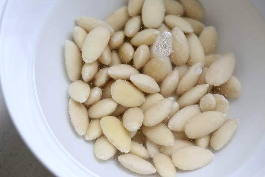 How to make Almond Milk with raw almonds or blanched almonds. Blanched almond milk has a less prominent flavor which works great for Indian Chai | Pitzn
