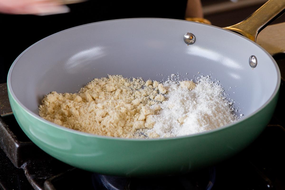 roasting the coconut and almond flour in the pan