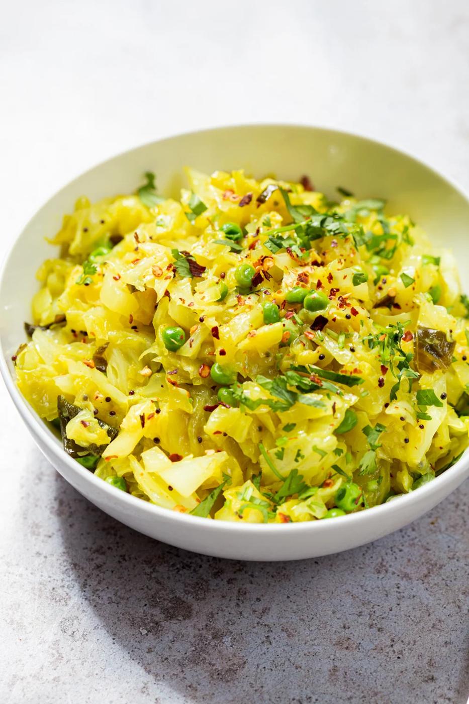 Indian Cabbage and Peas in a white bowl