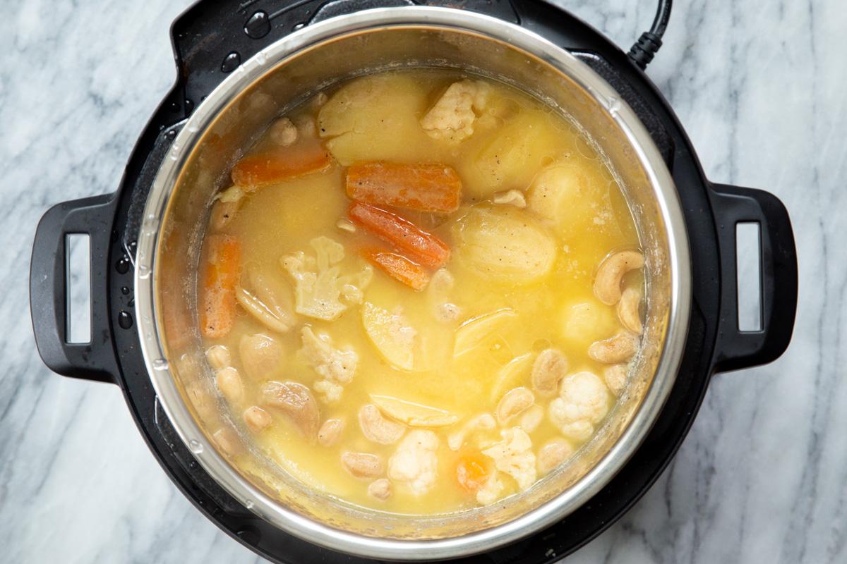 cooked veggies and cashews in an instant pot