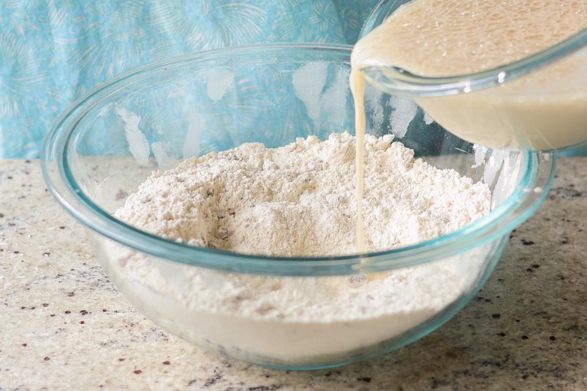 adding wet ingredients to the dry