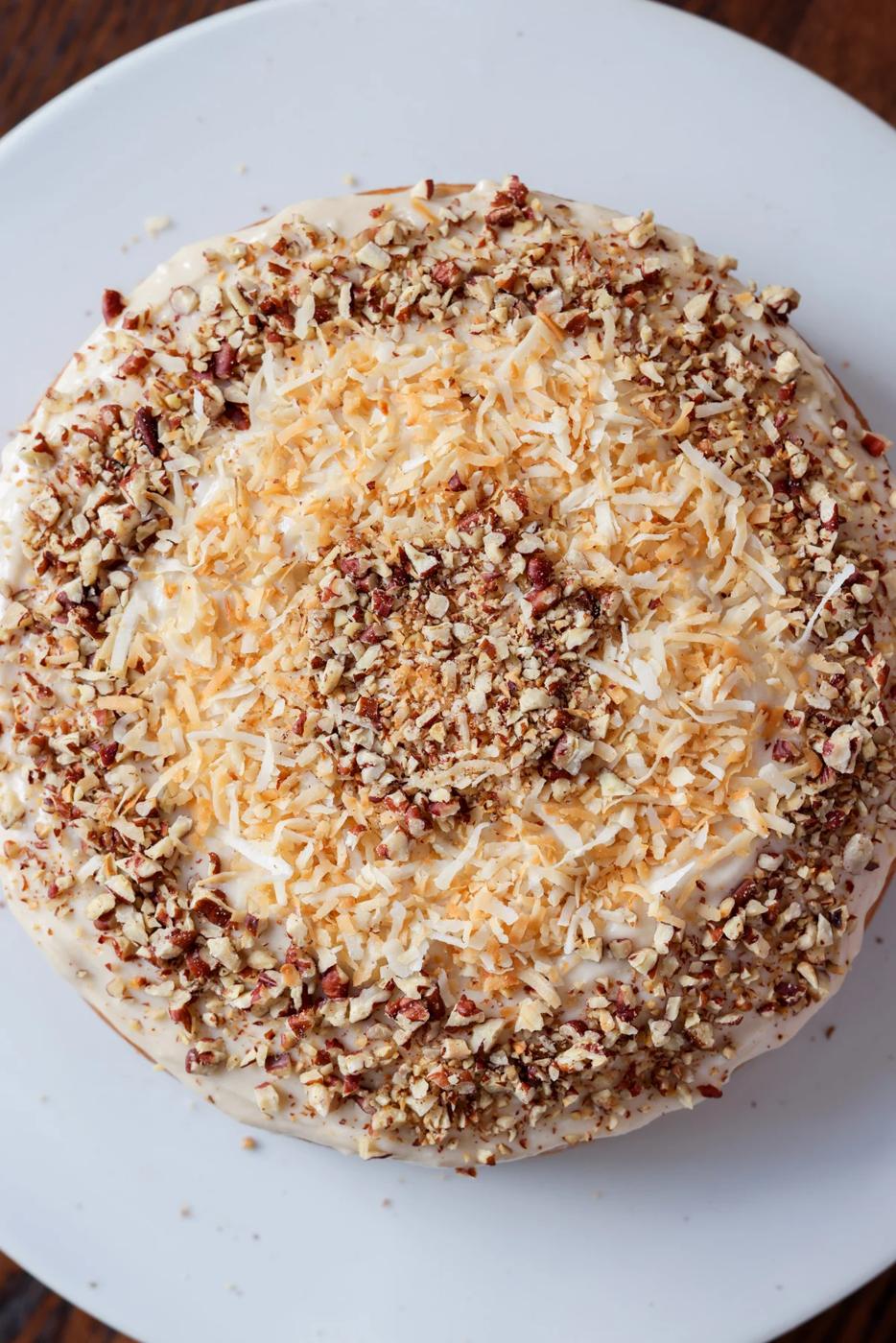 Italian cream cake on a dessert stand