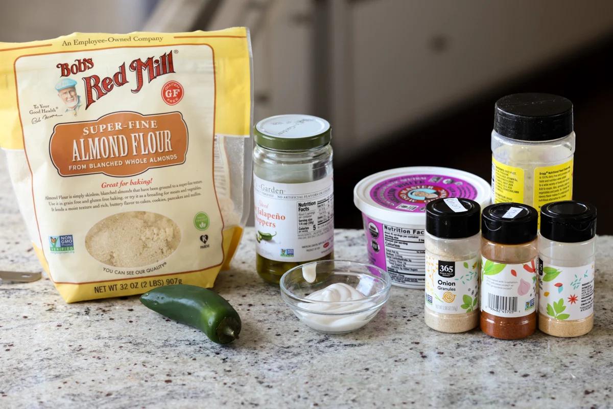 jalapeno popper cheese ball ingredients on the kitchen counter