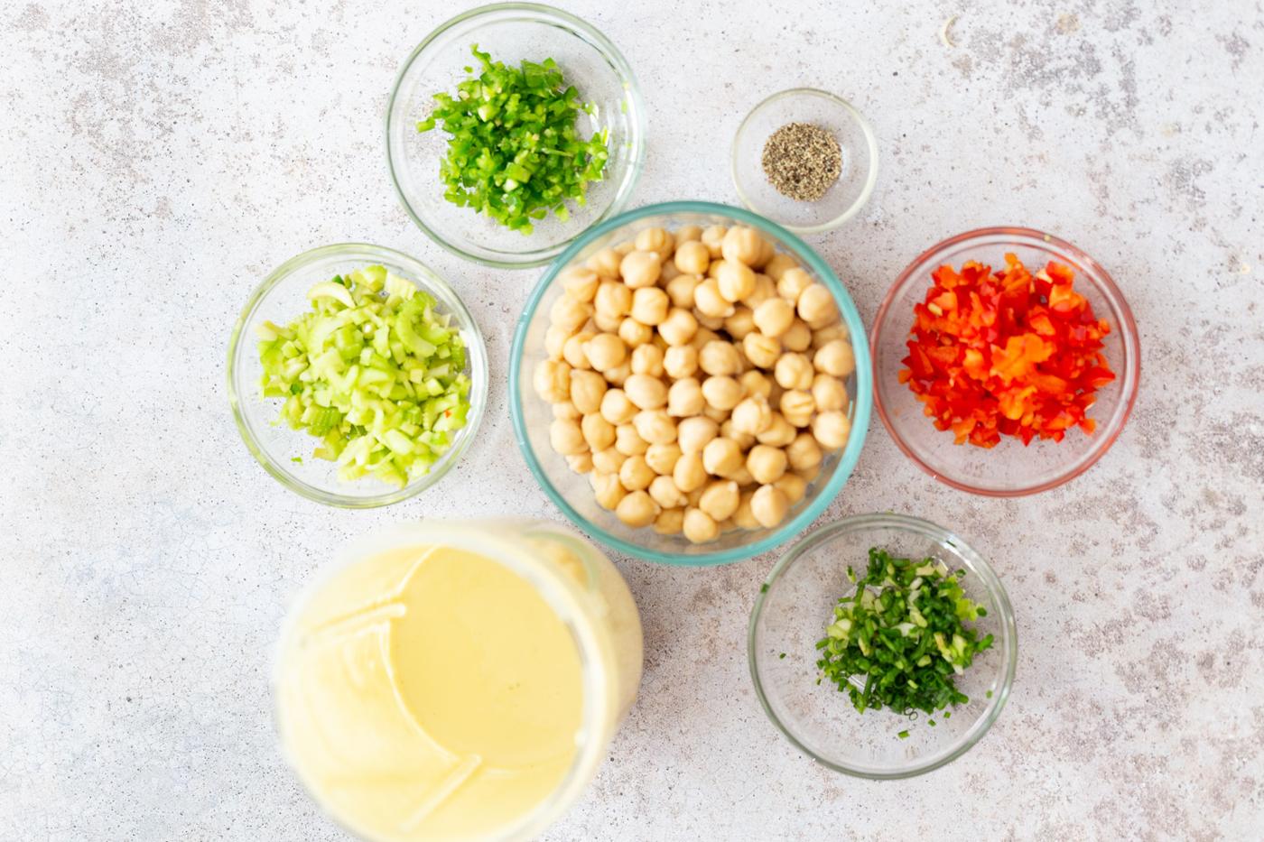 overhead shot of ingredients needed for making vegan chickpea salad