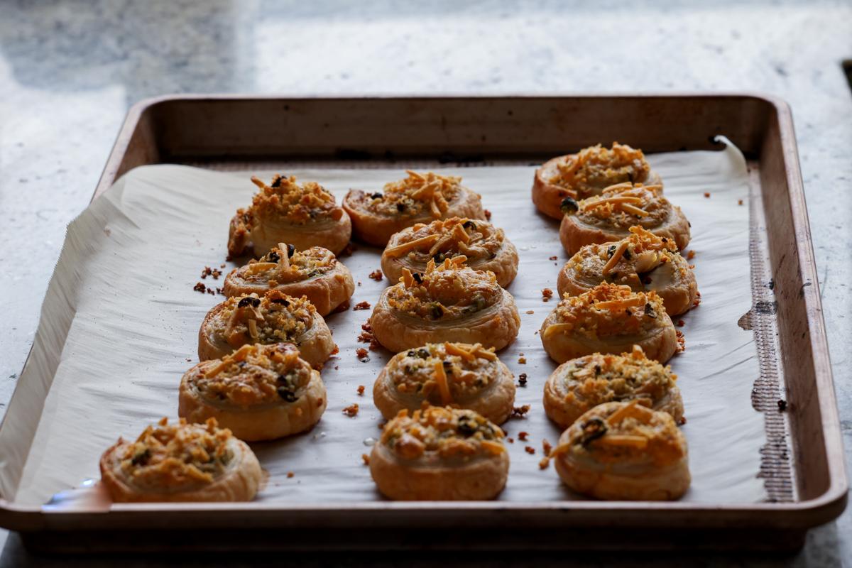 jalapeño popper pinwheels on the baking sheet after baking