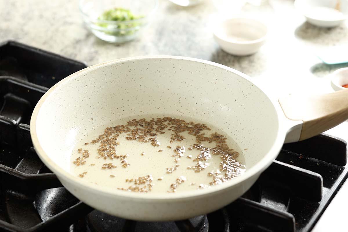 toasted cumin seeds in the pan