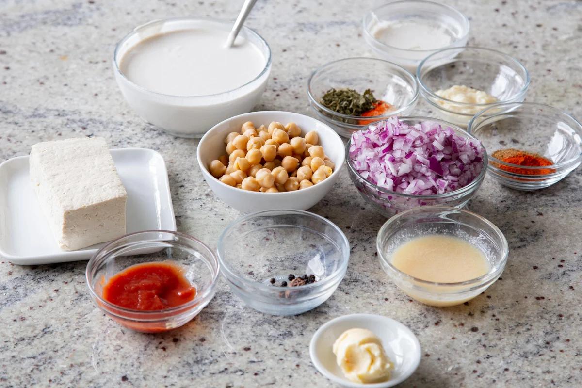 kasuri malai murg ingredients in bowls on a kitchen countertop