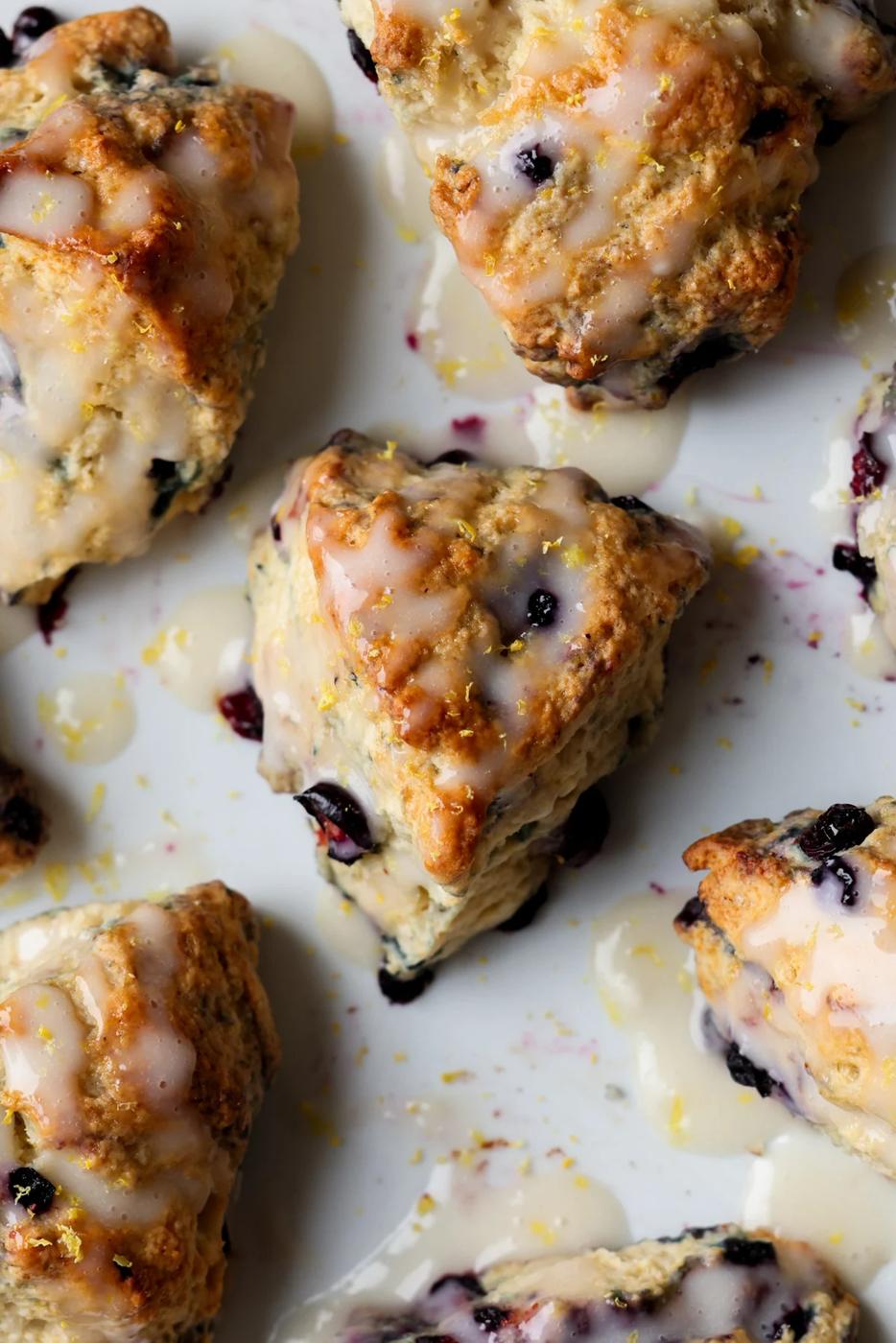 lemon blueberry scones on the serving tray, after glazing