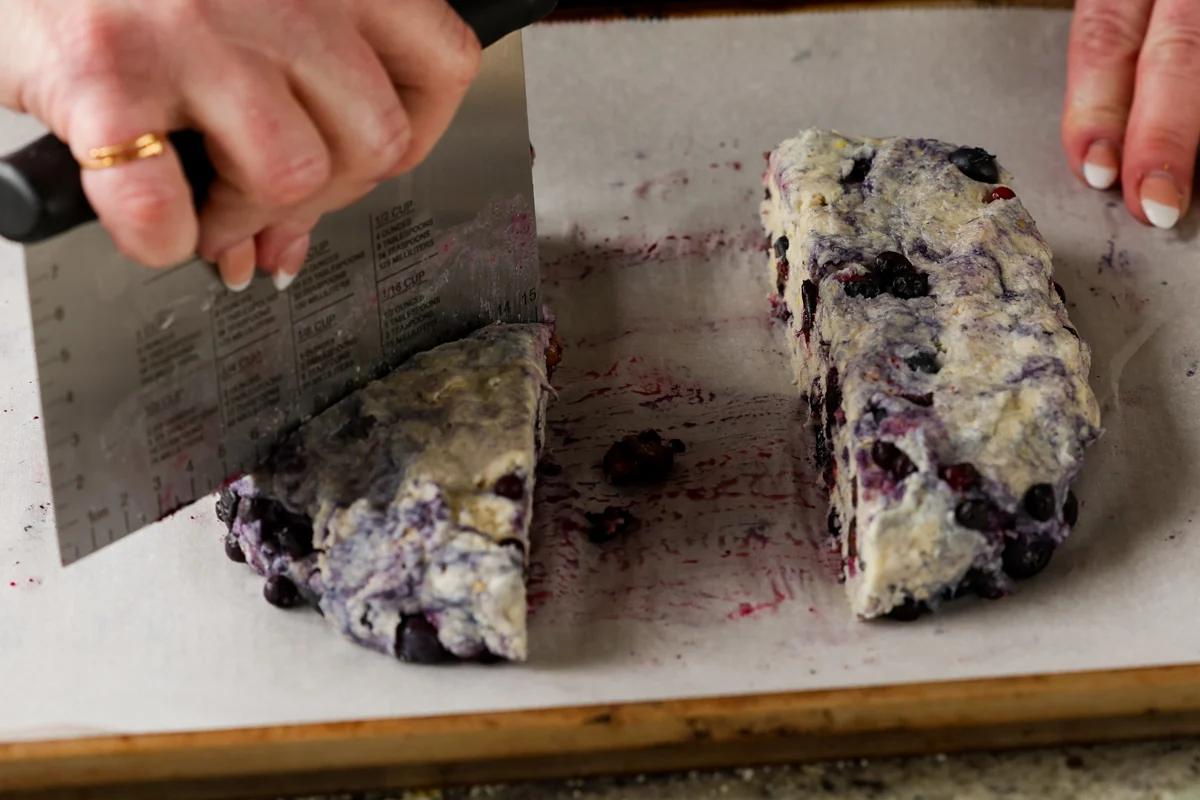 cutting the dough into scone shapes