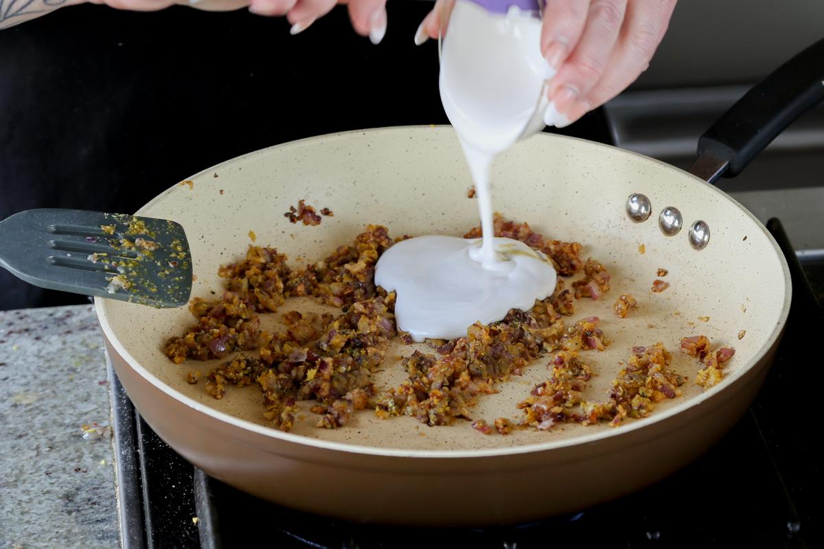 adding non-dairy yogurt to the pan