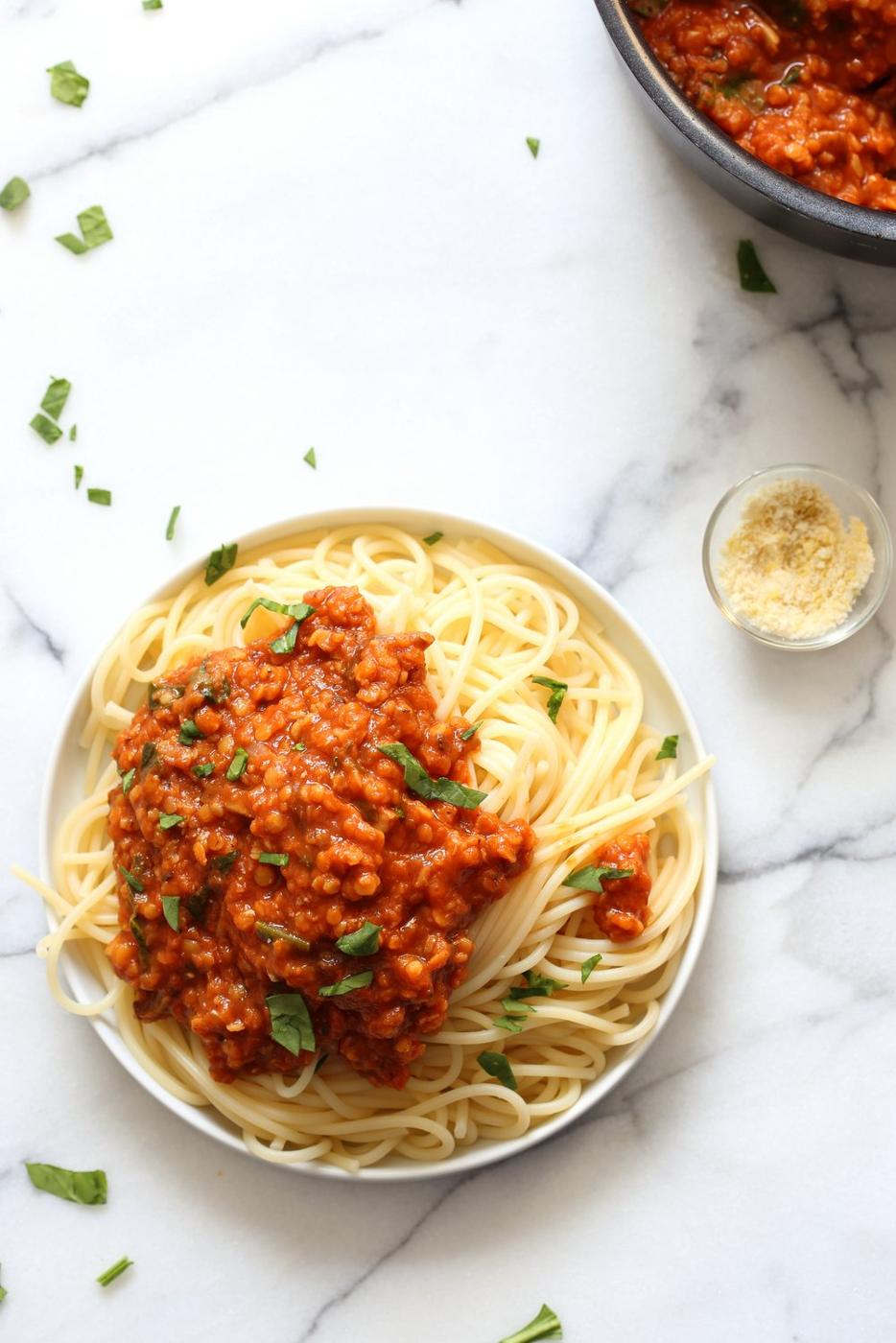This Lentil Bolognese Sauce is hearty with Red lentils and Mushrooms and great with Spaghetti or other pasta. #Vegan #Soyfree #Nutfree #Recipe #VeganRicha. Can be gluten-free with #glutenfree #pasta | VeganRicha.com