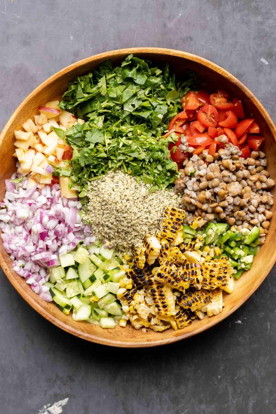 lentil dip ingredients in a bowl before adding the dressing