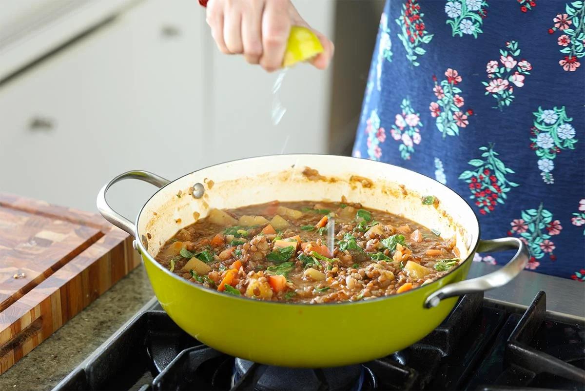 adding lemon juice to the pan
